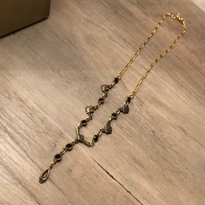 Gold shell and black bead tear drop necklace
